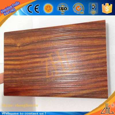 Hot 2015 exported shenzhen window 100 tons 6063 aluminium tube wooden door patterns